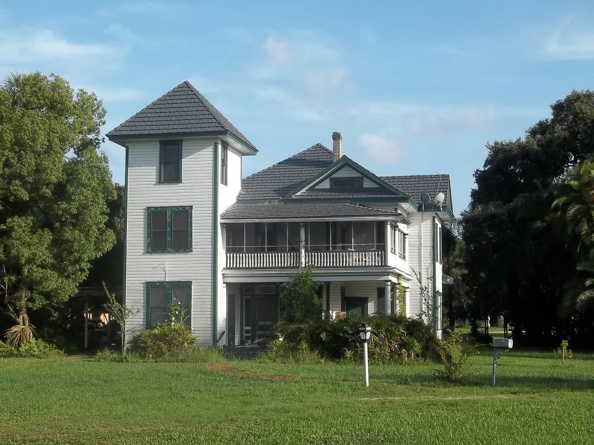 Two-story A. P. Dickman House in Ruskin with a corner tower and porches